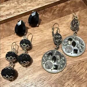Three pairs of earrings…silver toned and black